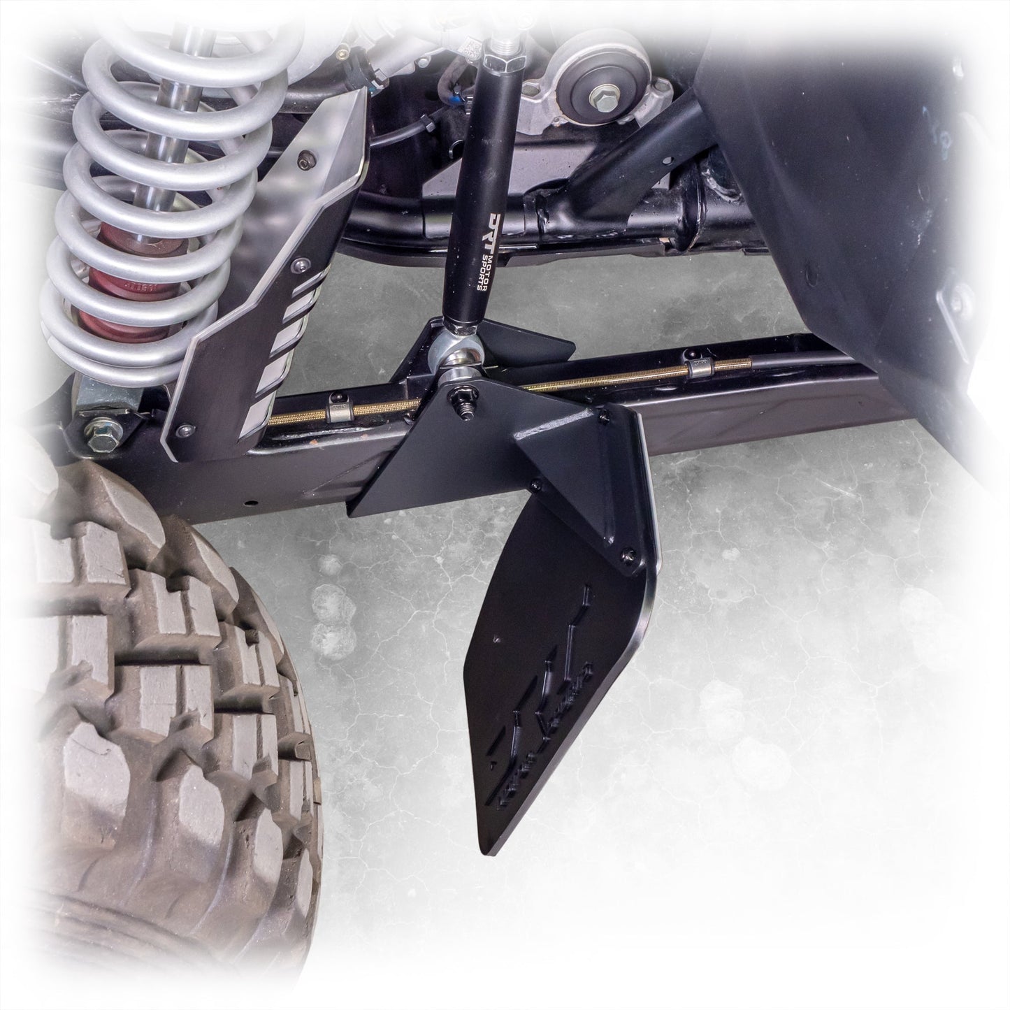 Bolt-on rock guard mount on trailing arm of Polaris RZR Pro XP