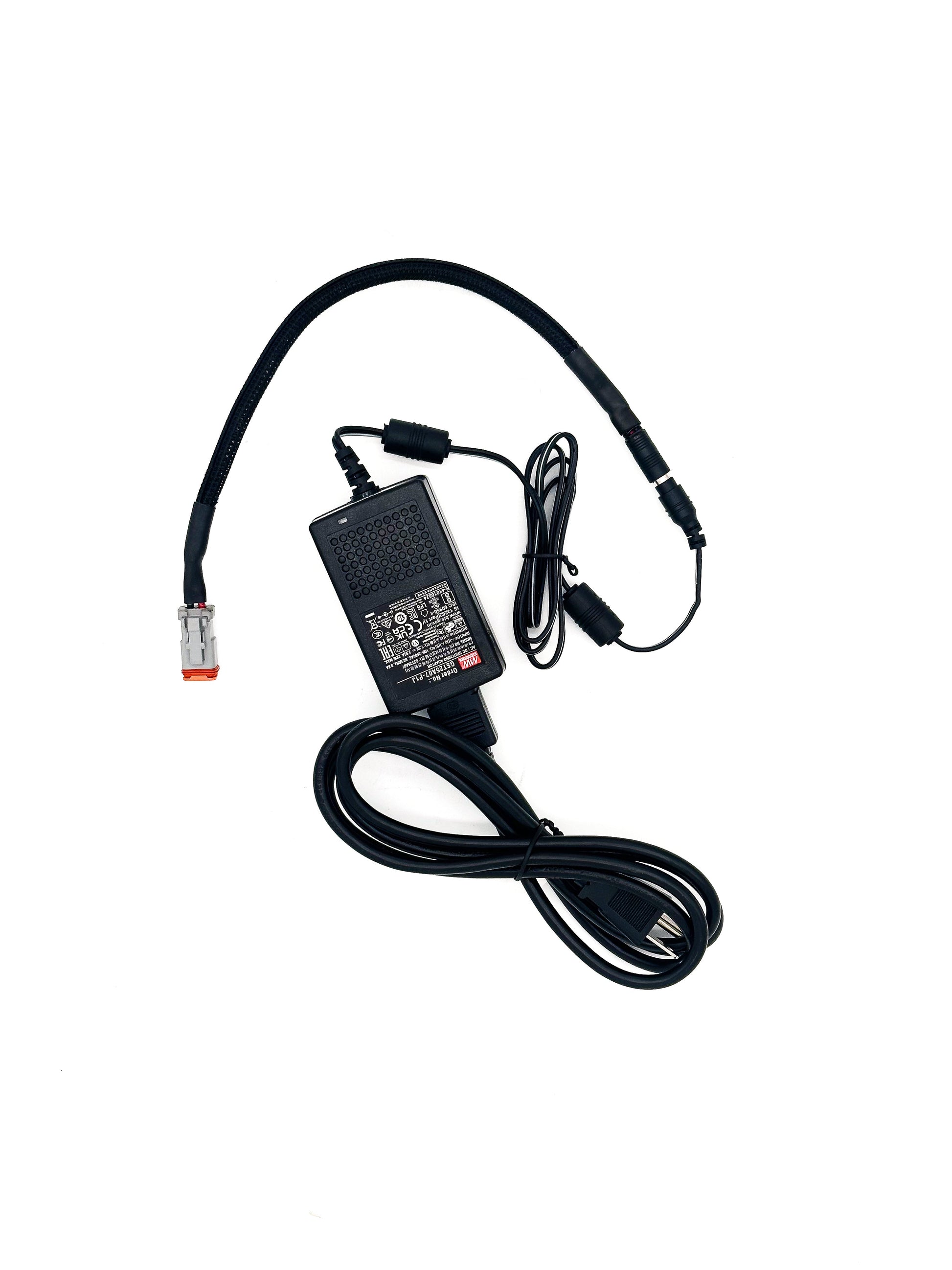 Black power adapter with cable on a white background