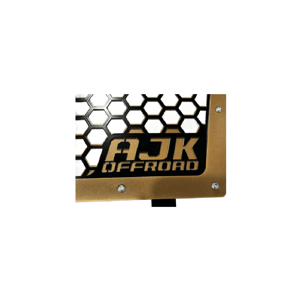 Kawasaki KRX Front Grill by AJK Offroad in Bronze Close Up of Logo