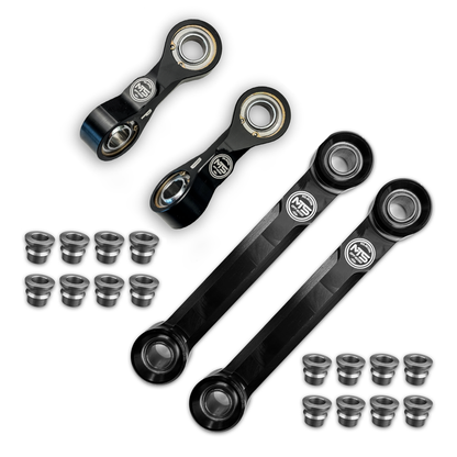 Set of black metal connecting rods with bearings on a white background