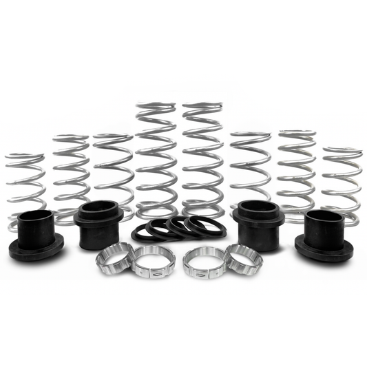 Set of springs and related components on a white background