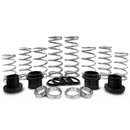 Set of springs and related components on a white background
