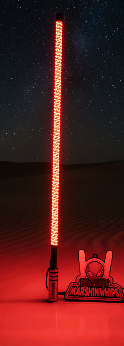 Light-up UTV Whip with a dunes background and 'Marshin Whips' branding.
