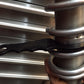 Adjust the cross over with the spring in place.